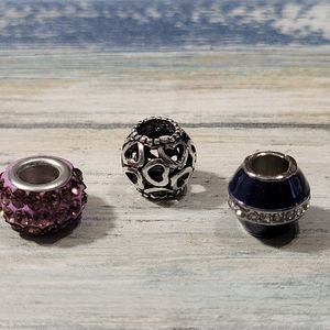 Three Bracelet Charms.